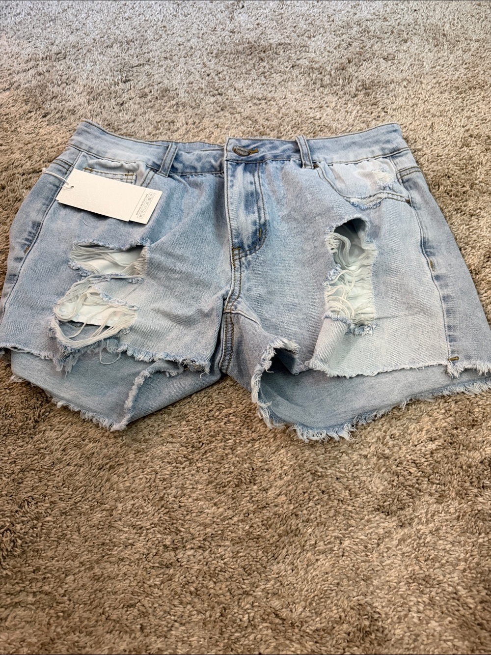 Light Wash Distressed Denim Shorts - Women's